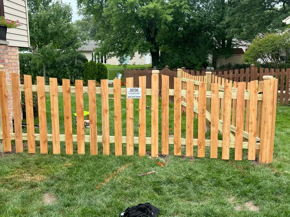 Cedar wood fence installed on a residential streetscape
