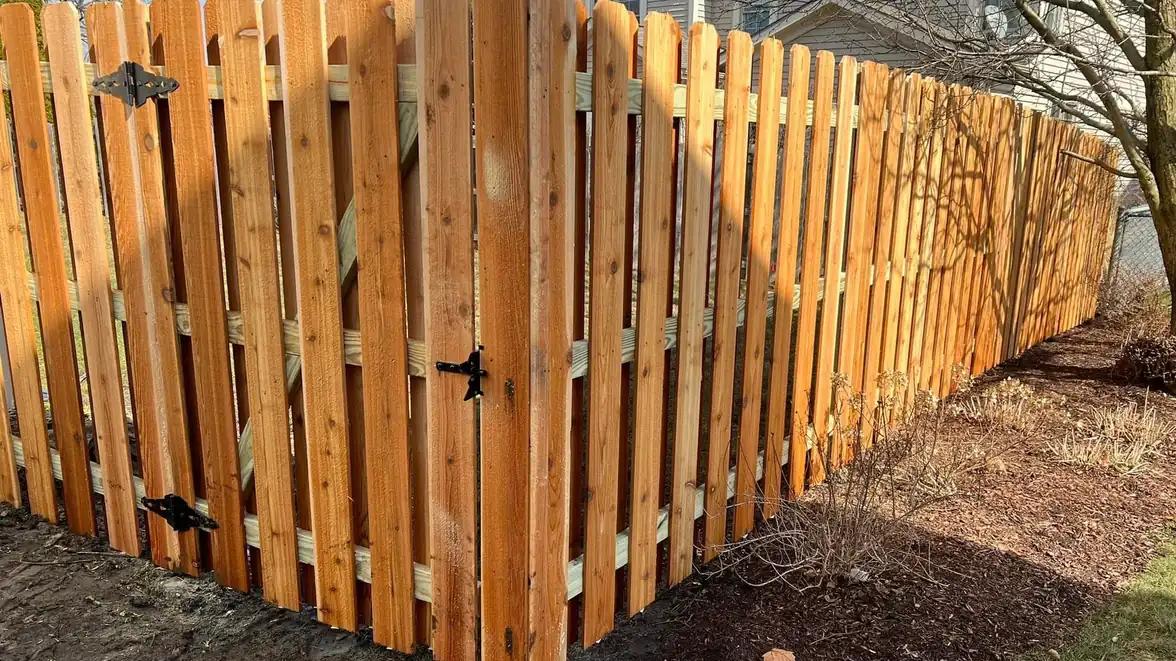 Cedar wood privacy fence installed on a residential property